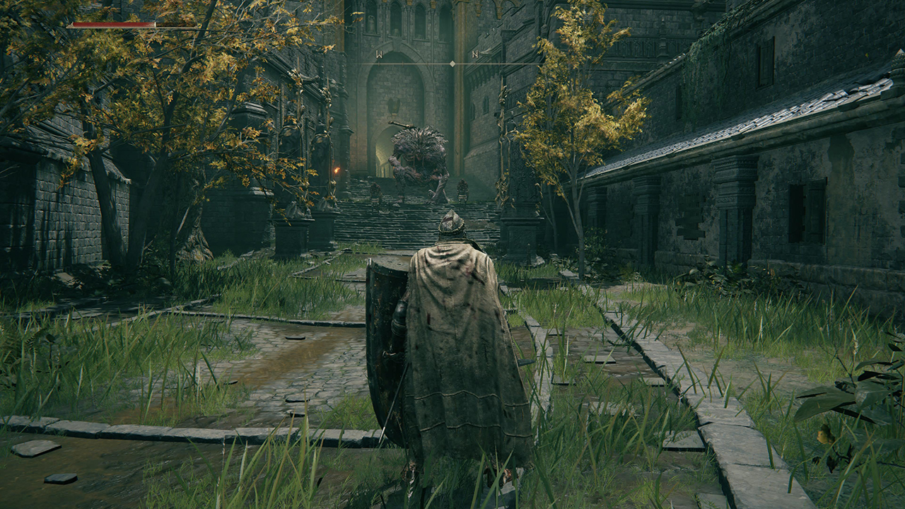 Captura de pantalla del juego de un troll en Stormveil Castle en Elden Ring que debe ser atraído para romper la estatua resplandeciente.